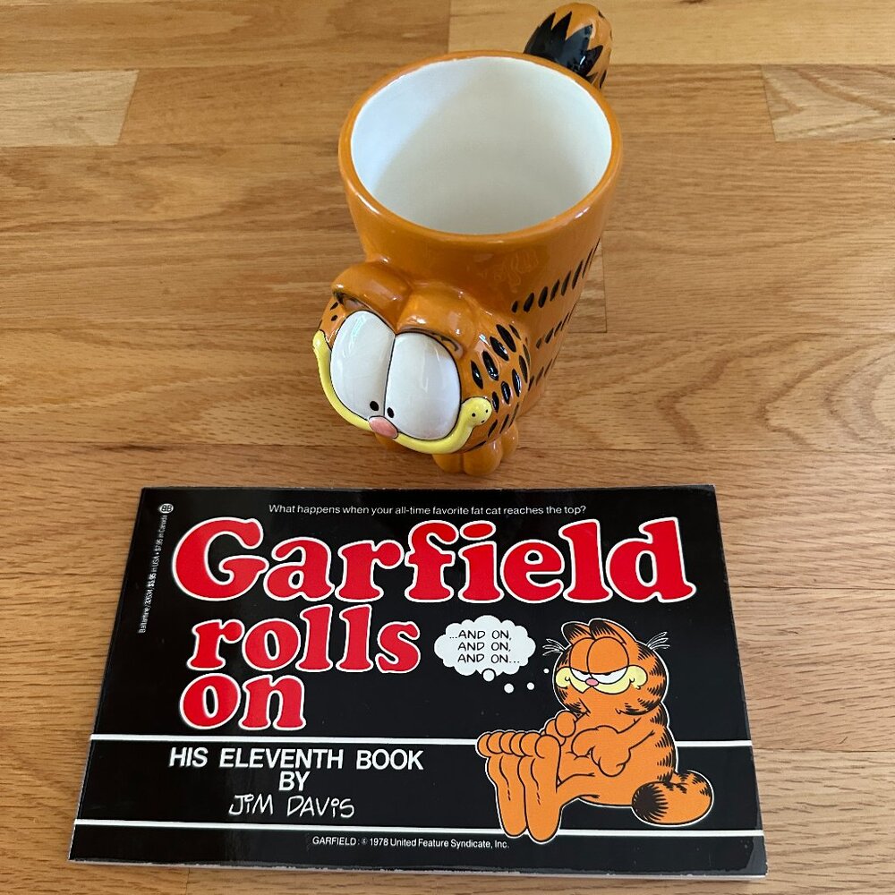 Vintage 3D Garfield Mug and Garfield rolls on book by Jim Davis
